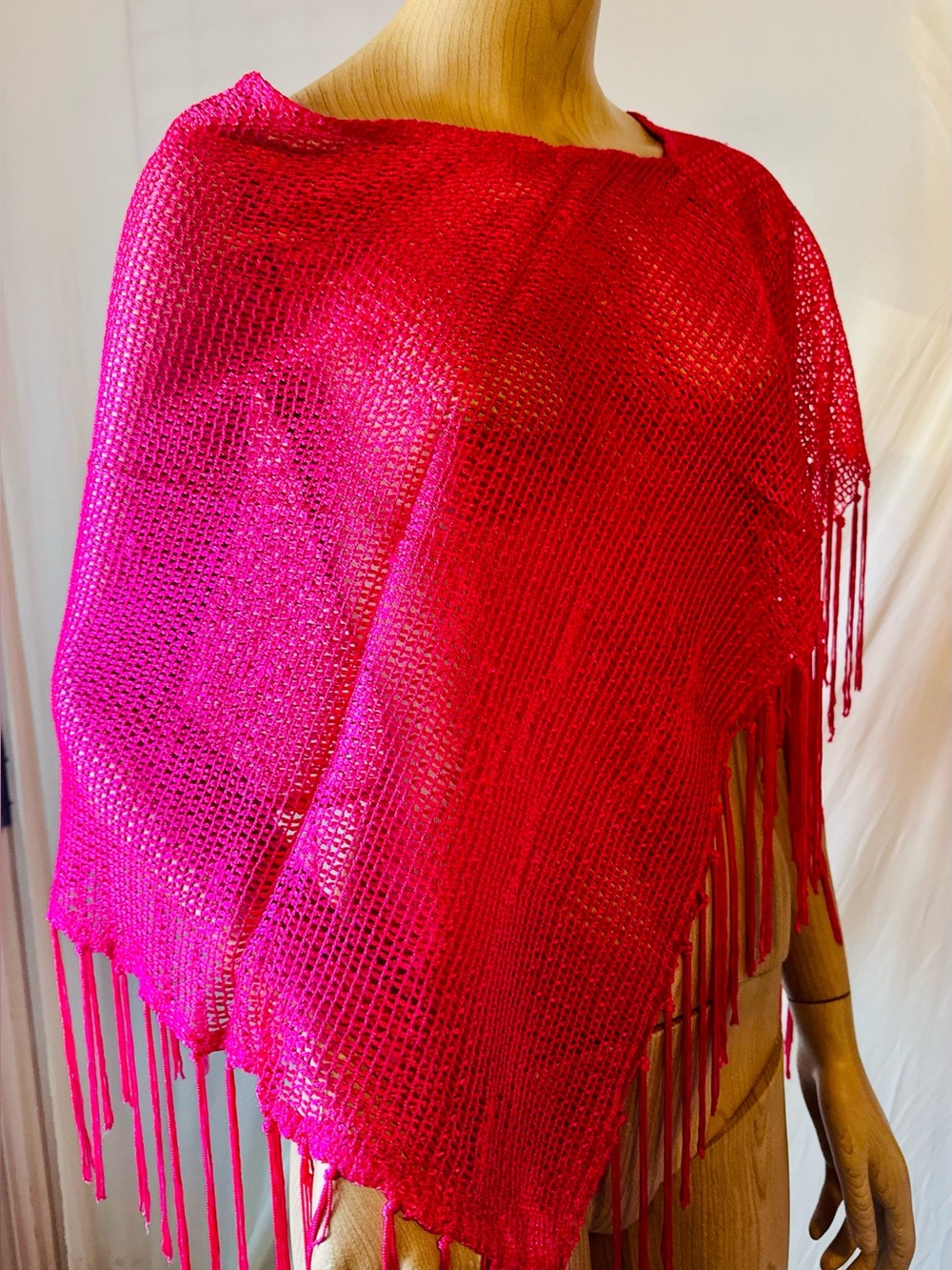 Women's Hot Pink Metallic Knit Asymmetric Poncho with Fringe